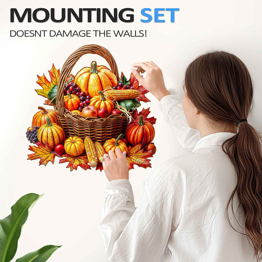 Woman applying an Autumn wooden jigsaw puzzle sticker on the wall with a basket of pumpkins and leaves.