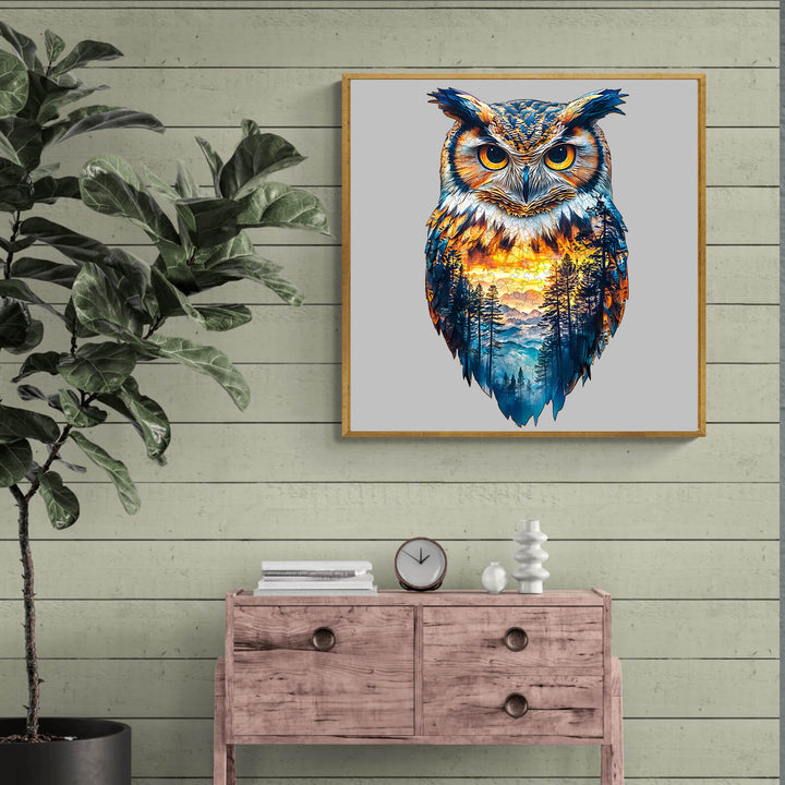 Colorful forest owl artwork displayed above a wooden dresser with plants, showcasing vibrant nature elements.