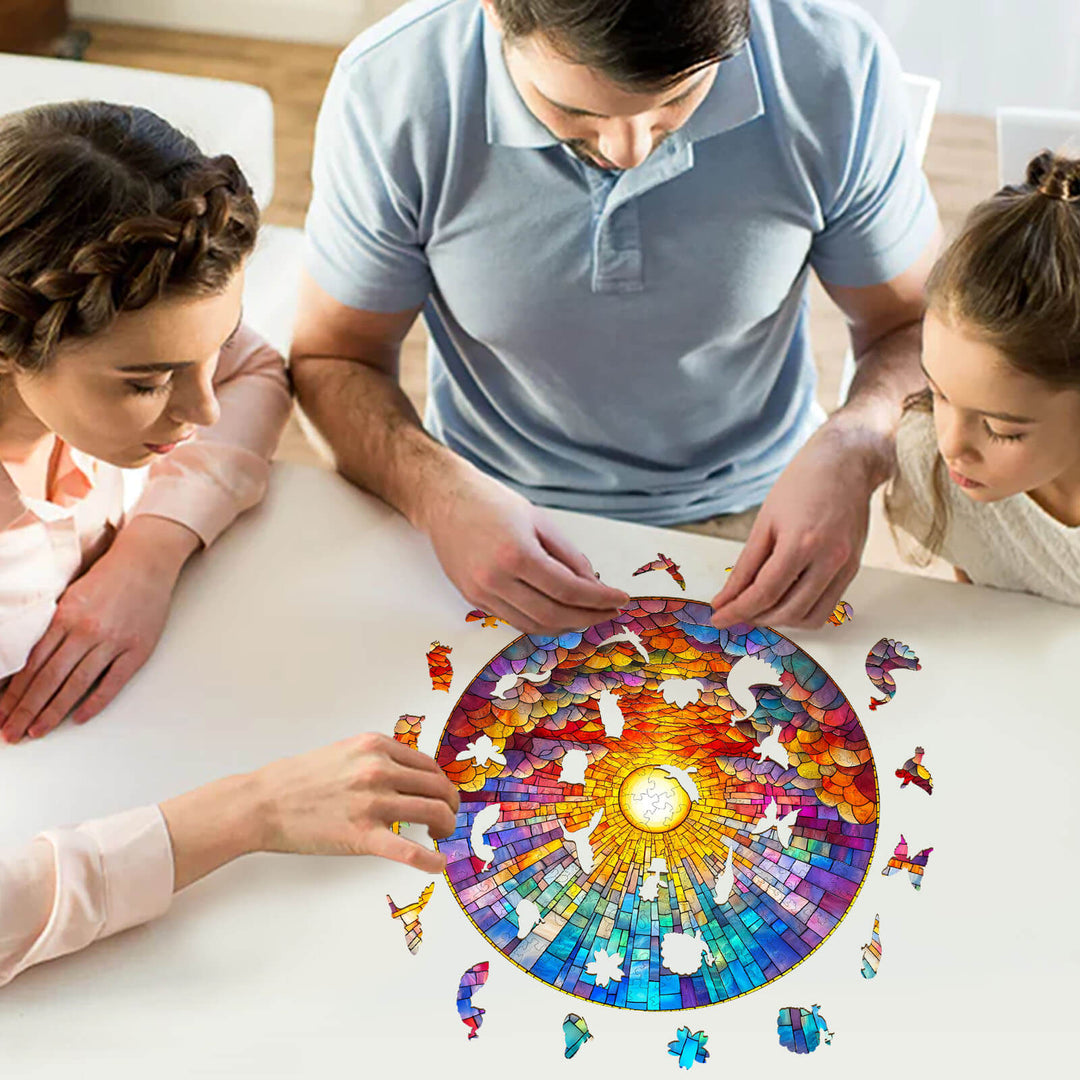 Family enjoying the Stained Glass Rainbow Wooden Jigsaw Puzzle together at a table, enhancing focus and cognitive skills.