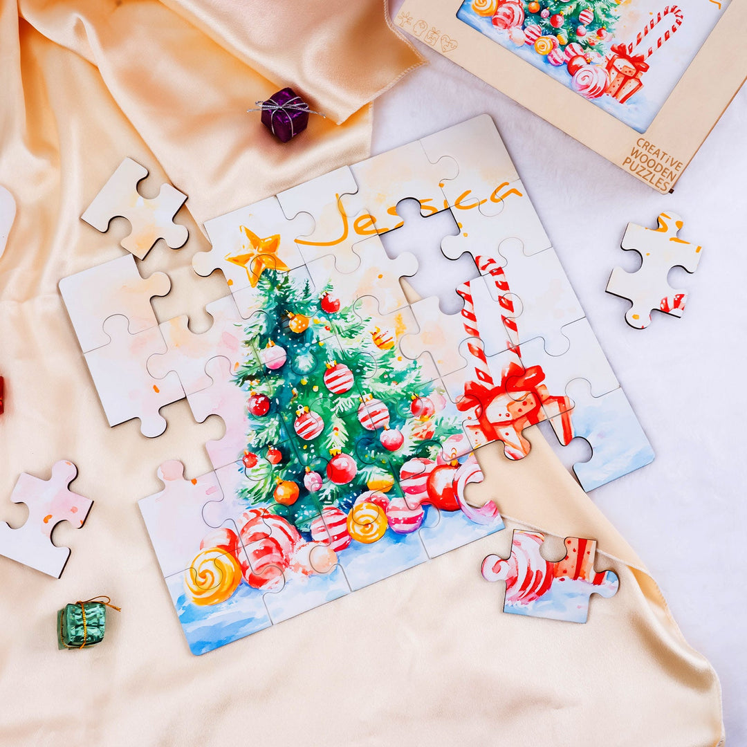 Personalized wooden jigsaw puzzle featuring a colorful Christmas tree with the name Jessica, surrounded by candy canes and festive sweets.