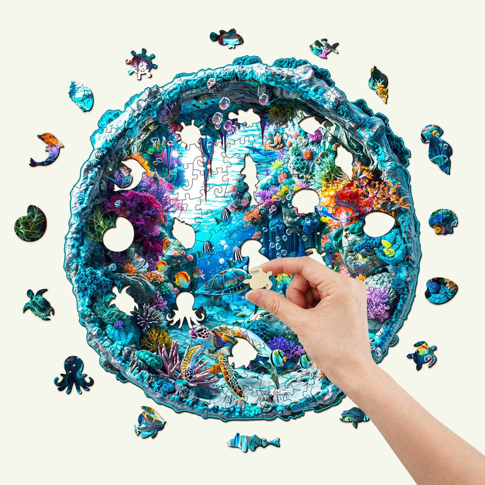 A vibrant 3D Seabed wooden jigsaw puzzle being assembled, featuring colorful marine life and intricate details.