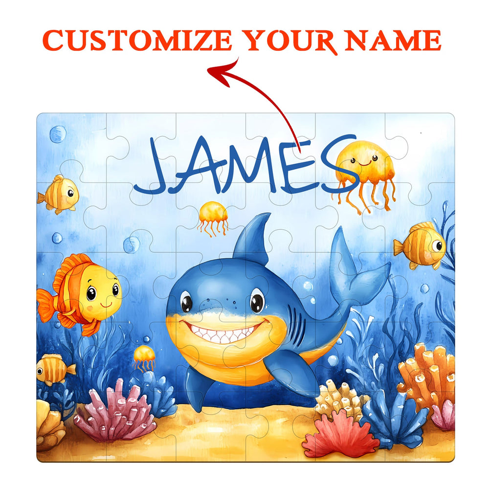 Personalized Ocean Friends jigsaw puzzle featuring a friendly shark and vibrant sea creatures, customizable with your child's name.