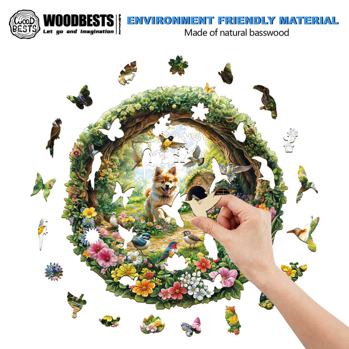Person assembling Spring Birds wooden jigsaw puzzle made from natural basswood featuring vibrant scenery and butterflies.