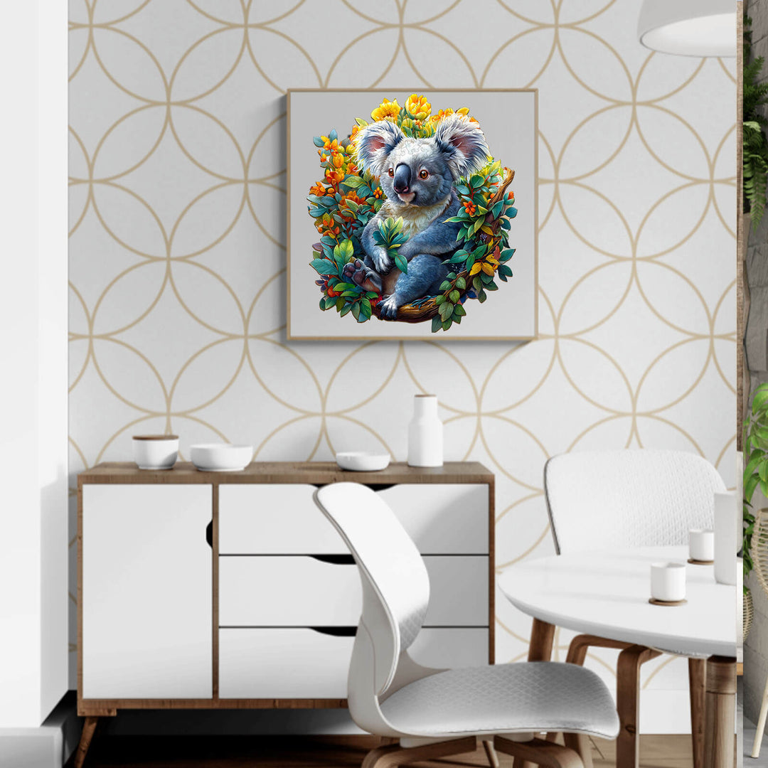 Colorful koala wall art surrounded by foliage, adorning a modern home interior with stylish furniture.