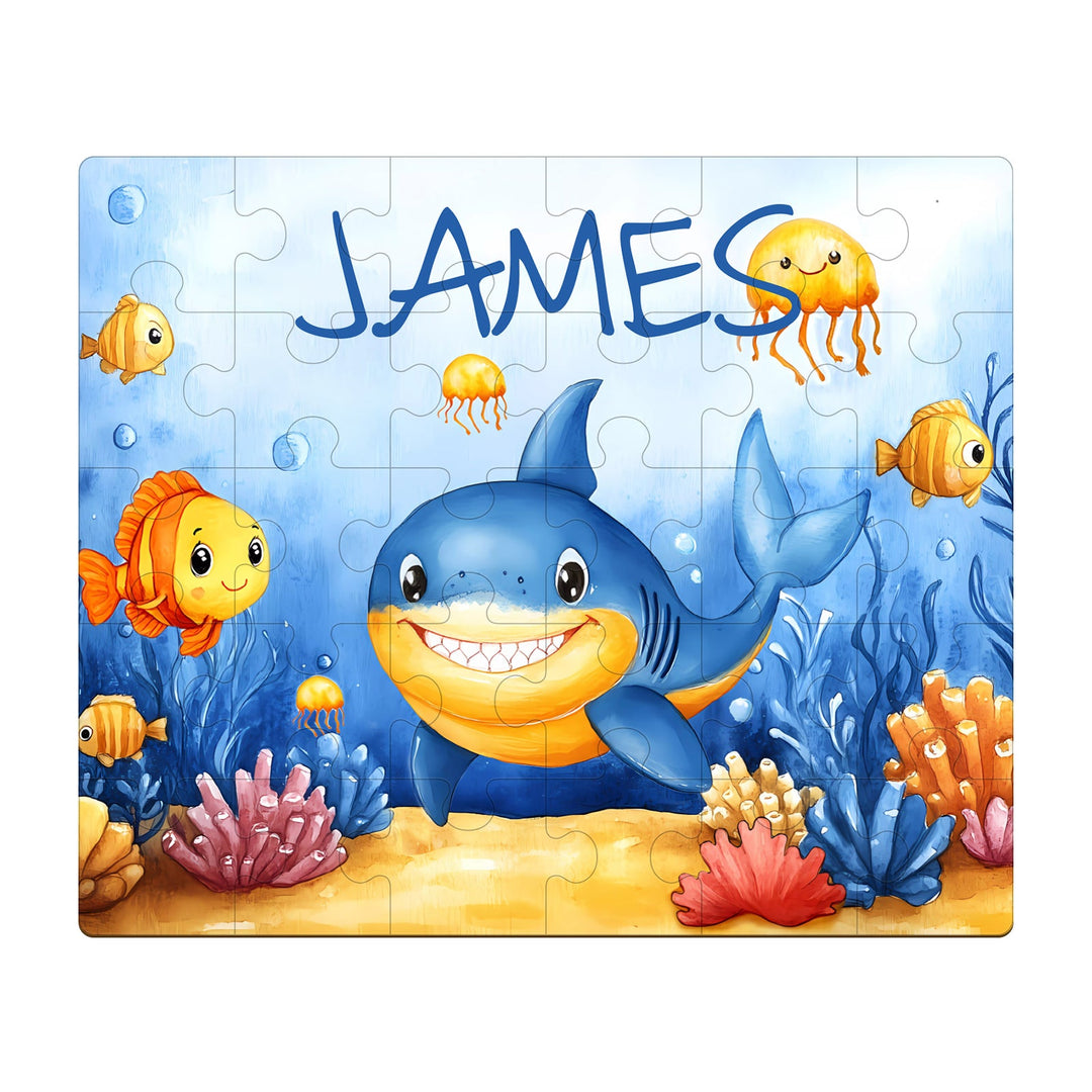 Personalized wooden jigsaw puzzle for kids with a friendly shark and colorful sea creatures, featuring the name James.
