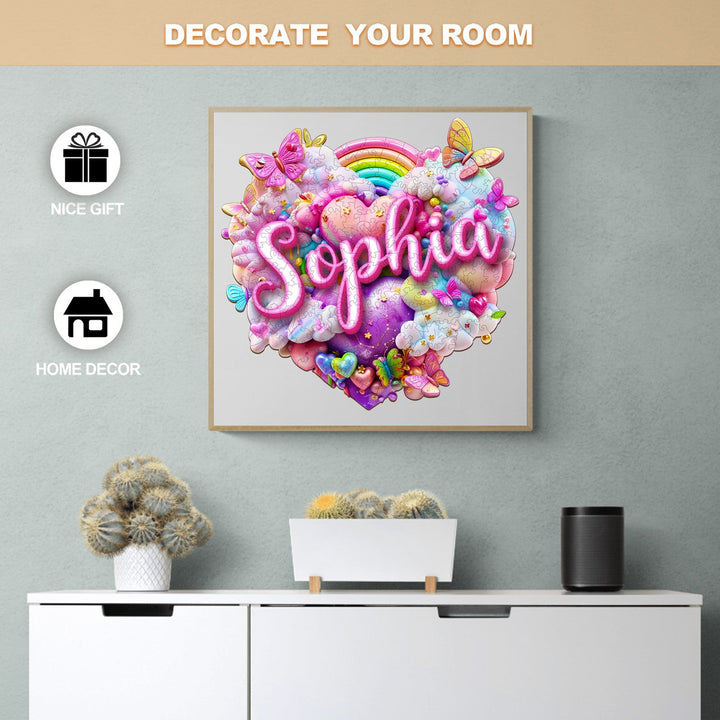 Colorful wall art featuring the name Sophia in a heart shape with rainbows and butterflies, perfect for home decor.