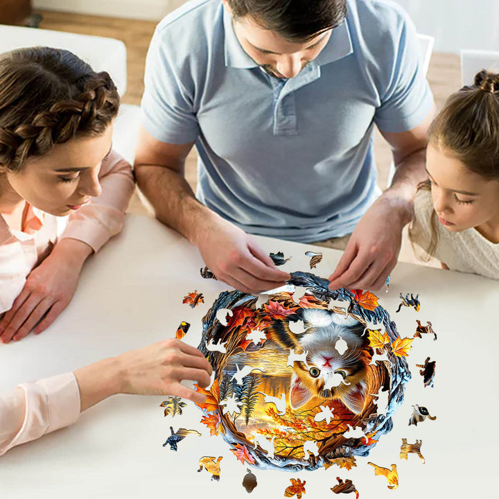 Family enjoying a 3D Kitten in Autumn Wooden Jigsaw Puzzle at a table, focusing on puzzle pieces together.