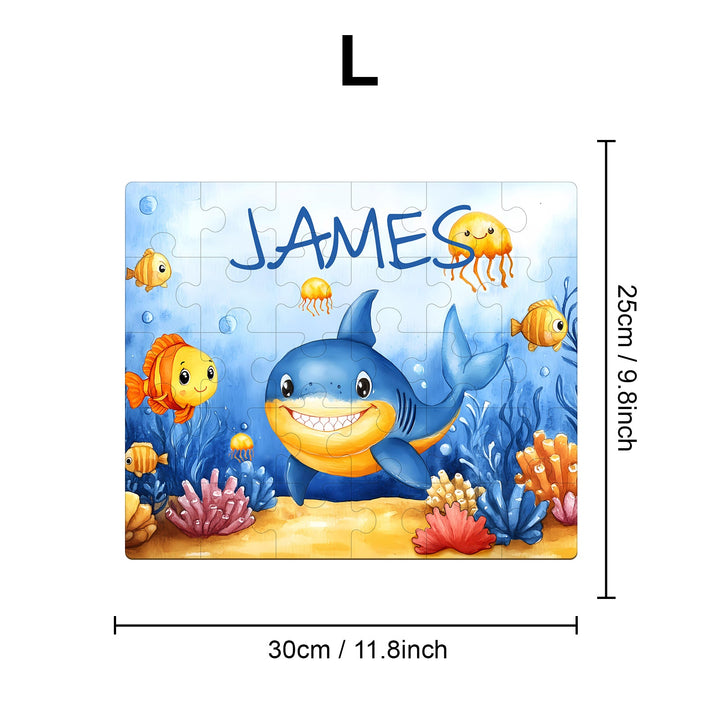 Personalized wooden jigsaw puzzle featuring a friendly shark and colorful sea creatures, customized with the name James.