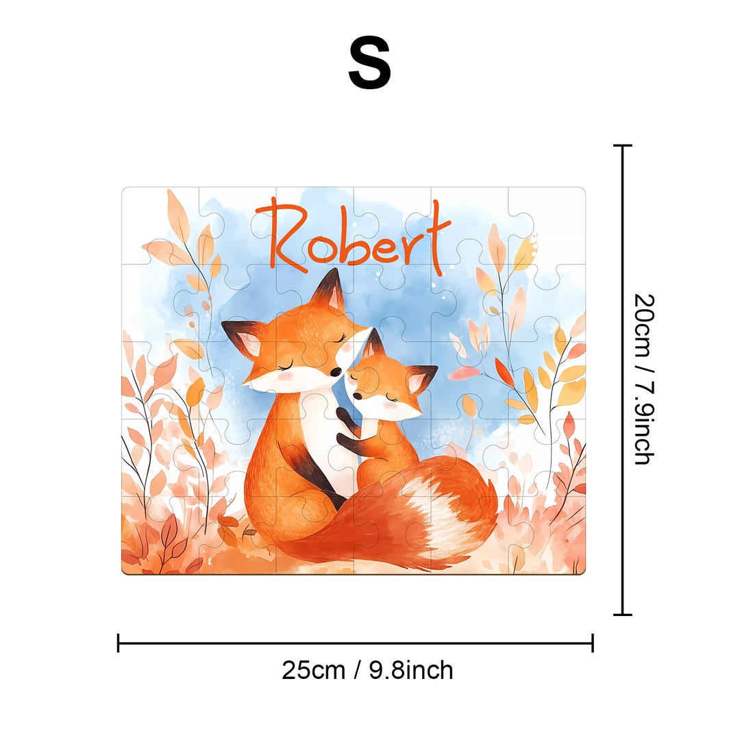 Custom wooden jigsaw puzzle featuring a mother fox and cub, personalized with the name Robert, against an autumn backdrop.