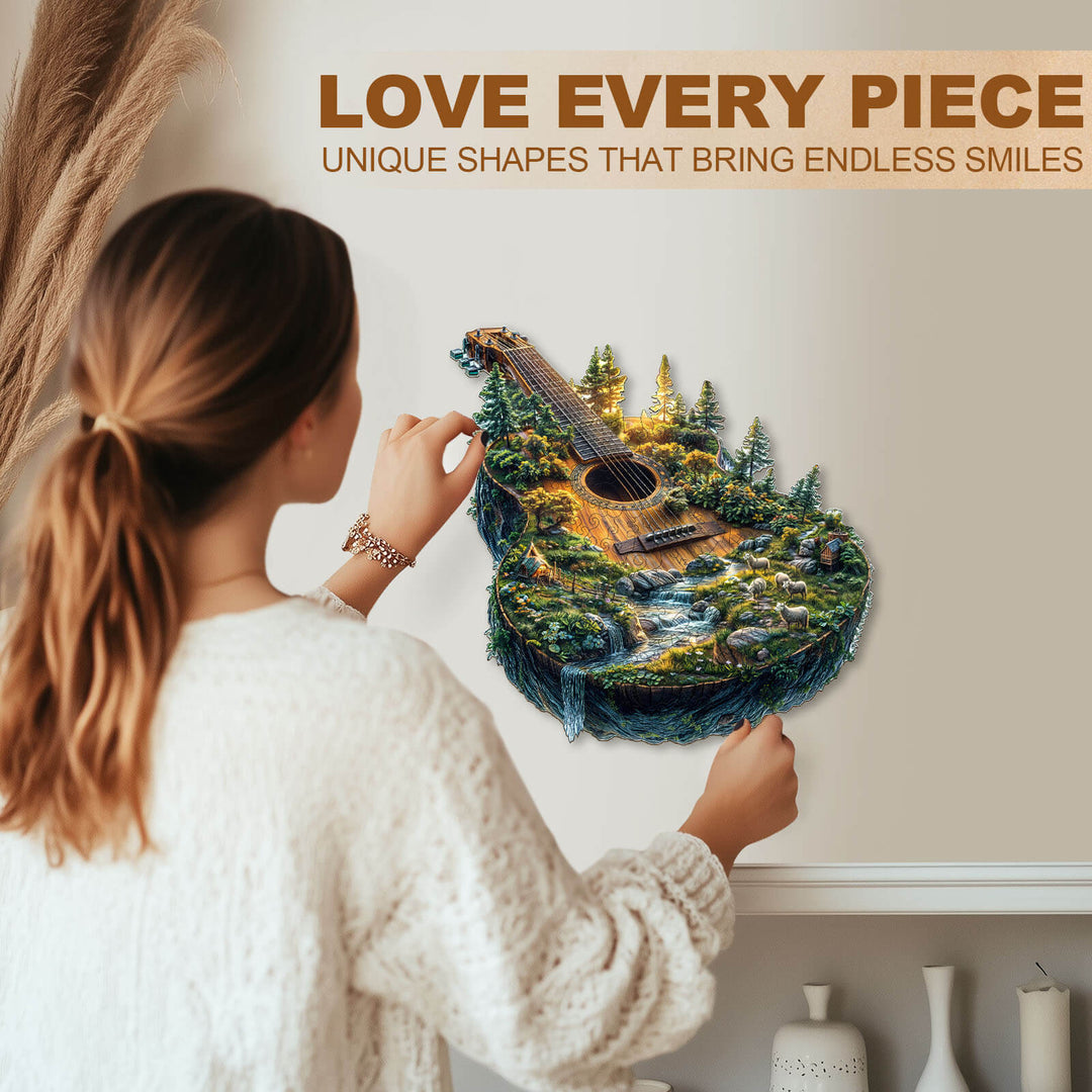 Person admiring a unique Forest guitar wooden jigsaw puzzle, showcasing intricate designs and nature themes.